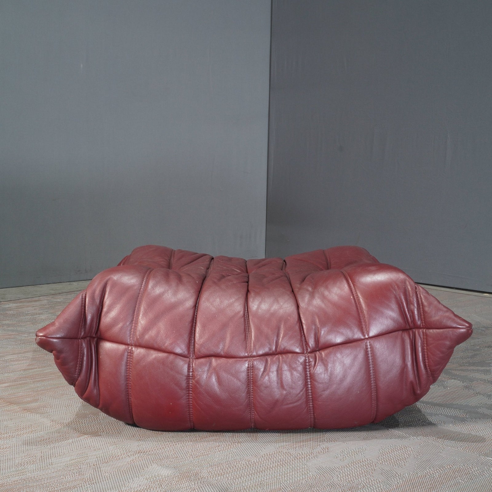Ligne Roset Burgundy Leather Modular Sofas and Footstool, by Michel Ducaroy, Set of Six @ REHAUS