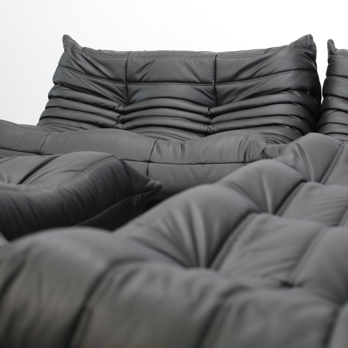 Ligne Roset by Michel Ducaroy Black Leather Togo Sofa, Set of Five @ REHAUS