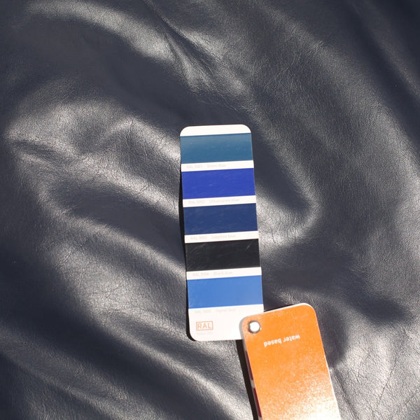 SCP Balzac Blue Leather Armchair and Footstool @ REHAUS