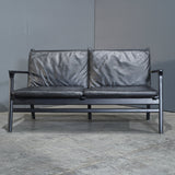 Stellar Works Rén Black Leather and Oak Two Seater Sofa by Space Copenhagen @ REHAUS